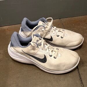 Nike White Sneakers with Light Blue Lining and Black Swoosh